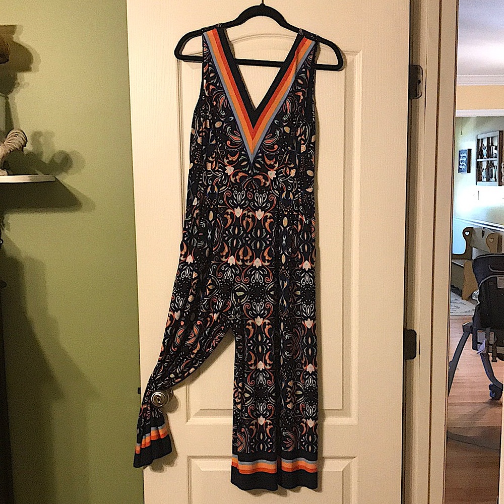 Size 8 jumpsuit.  Excellent condition